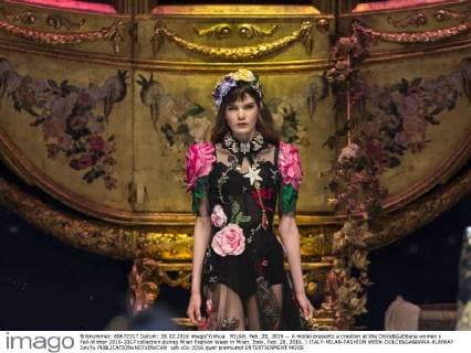 MILAN, Feb. 28, 2016 -- A model presents a creation at the Dolce&Gabbana women s Fall-Winter 2016-2017 collection during Milan Fashion Week in Milan, Italy, Feb. 28, 2016. ) ITALY-MILAN-FASHION WEEK-DOLCE&GABBANA-RUNWAY JinxYu 
