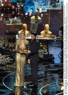 Feb 28, 2016 - Hollywood, California, U.S. - Margot Robbie and Jared Leto present the Oscar for Achievement in makeup, during the live ABC Telecast of The 88th Oscars at the Dolby Theatre. Hollywood U.S. - ZUMAz03_