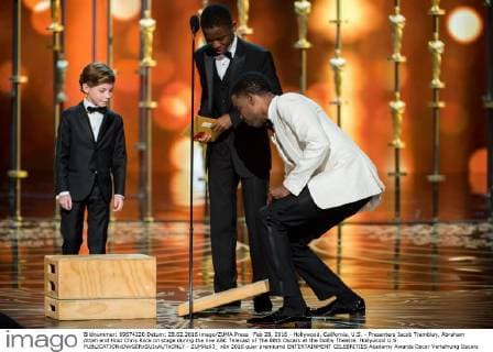 Feb 28, 2016 - Hollywood, California, U.S. - Presenters Jacob Tremblay, Abraham Attah and Host Chris Rock on stage during the live ABC Telecast of The 88th Oscars at the Dolby Theatre. Hollywood U.S. - ZUMAz03_