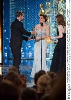 Feb 28, 2016 - Hollywood, California, U.S. - Leonardo DICAPRIO (Di Caprio) accepts the Oscar for Performance by an actor in a Leading role, for work on œThe Revenant from presenter Julianne Moore (R) during the live ABC Telecast of The 88th Oscars at the Dolby Theatre. Hollywood U.S. - ZUMAz03_