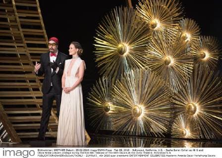 Feb 28, 2016 - Hollywood, California, U.S. - Sasha Baron Cohen as Ali G and Olivia Wilde present onstage during the live ABC Telecast of The 88th Oscars at the Dolby Theatre. Hollywood U.S. - ZUMAz03_