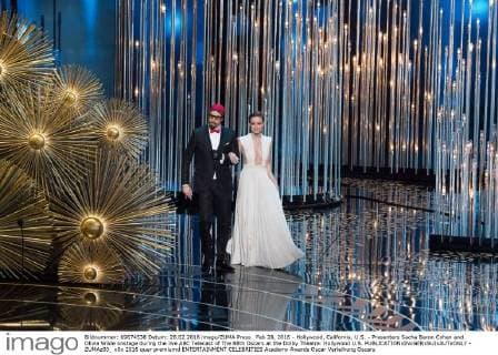 Feb 28, 2016 - Hollywood, California, U.S. - Presenters Sacha Baron Cohen and Olivia Wilde onstage during the live ABC Telecast of The 88th Oscars at the Dolby Theatre. Hollywood U.S. - ZUMAz03_