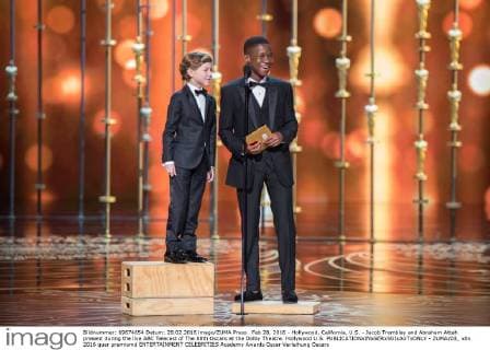 Feb 28, 2016 - Hollywood, California, U.S. - Jacob Tremblay and Abraham Attah present during the live ABC Telecast of The 88th Oscars at the Dolby Theatre. Hollywood U.S. - ZUMAz03_