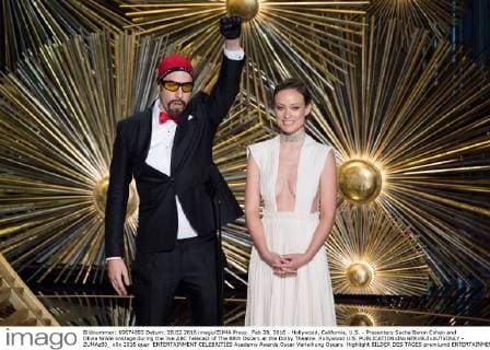 Feb 28, 2016 - Hollywood, California, U.S. - Presenters Sacha Baron Cohen and Olivia Wilde onstage during the live ABC Telecast of The 88th Oscars at the Dolby Theatre. Hollywood U.S. - ZUMAz03_