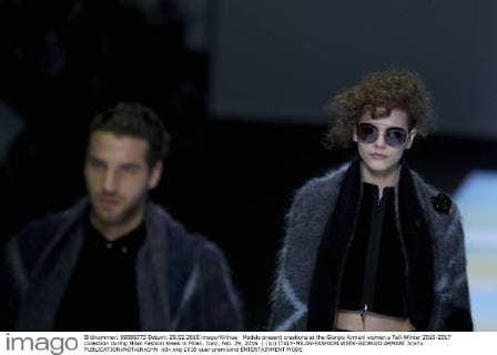 Models present creations at the Giorgio Armani women s Fall-Winter 2016-2017 collection during Milan Fashion Week in Milan, Italy, Feb. 29, 2016. ) (lyi) ITALY-MILAN-FASHION WEEK-GIORGIO ARMANI JinxYu 