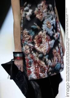 A model presents a creation at the Giorgio Armani women s Fall-Winter 2016-2017 collection during Milan Fashion Week in Milan, Italy, Feb. 29, 2016. ) (lyi) ITALY-MILAN-FASHION WEEK-GIORGIO ARMANI JinxYu 