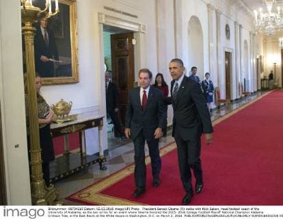 President Barack Obama (R) walks with Nick Saban, head football coach of the University of Alabama, as the two arrive for an event where Obama honored the 2015- 2016 College Football Playoff National Champion Alabama Crimson Tide, in the East Room at the White House in Washington, D.C. on March 2, 2016.  WAP20160302338 KEVINxDIETSCH