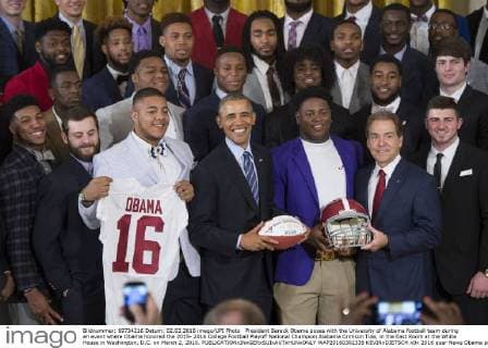 President Barack Obama poses with the University of Alabama football team during an event where Obama honored the 2015- 2016 College Football Playoff National Champion Alabama Crimson Tide, in the East Room at the White House in Washington, D.C. on March 2, 2016.  WAP20160302339 KEVINxDIETSCH