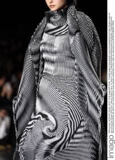 A model takes to the catwalk during the presentation of Issey Miyake s show as part of the Fall-Winter 2016-2017 Fashion Week in Paris on March 4, 2016.  PAR20160304102 MAYAxVIDON-WHITE
