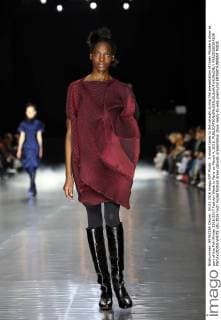 A model takes to the catwalk during the presentation of Issey Miyake s show as part of the Fall-Winter 2016-2017 Fashion Week in Paris on March 4, 2016.  PAR20160304108 MAYAxVIDON-WHITE