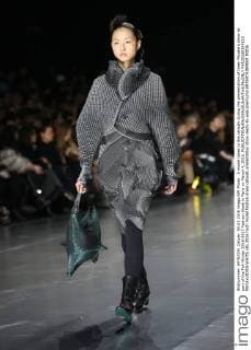 A model takes to the catwalk during the presentation of Issey Miyake s show as part of the Fall-Winter 2016-2017 Fashion Week in Paris on March 4, 2016.  PAR20160304110 MAYAxVIDON-WHITE