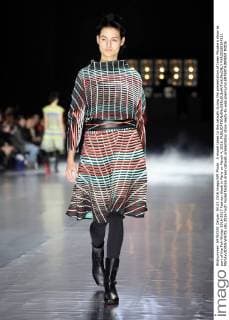 A model takes to the catwalk during the presentation of Issey Miyake s show as part of the Fall-Winter 2016-2017 Fashion Week in Paris on March 4, 2016.  PAR20160304111 MAYAxVIDON-WHITE