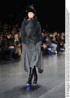 A model takes to the catwalk during the presentation of Issey Miyake s show as part of the Fall-Winter 2016-2017 Fashion Week in Paris on March 4, 2016.  PAR20160304103 MAYAxVIDON-WHITE