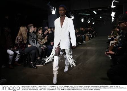 A model takes to the catwalk during the presentation of Masha Ma s Show as part of the Fall-Winter 2016-2017 Fashion Week in Paris on March 6, 2016.  PAR20160306104 MAYAxVIDON-WHITE