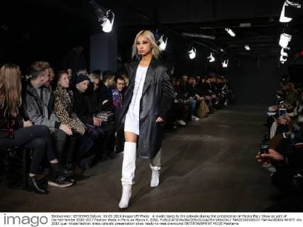 A model takes to the catwalk during the presentation of Masha Ma s Show as part of the Fall-Winter 2016-2017 Fashion Week in Paris on March 6, 2016.  PAR20160306107 MAYAxVIDON-WHITE