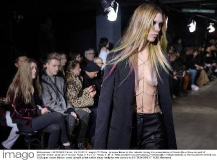 A model takes to the catwalk during the presentation of Masha Ma s Show as part of the Fall-Winter 2016-2017 Fashion Week in Paris on March 6, 2016.  PAR20160306111 MAYAxVIDON-WHITE