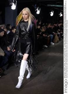 A model takes to the catwalk during the presentation of Masha Ma s Show as part of the Fall-Winter 2016-2017 Fashion Week in Paris on March 6, 2016.  PAR20160306108 MAYAxVIDON-WHITE