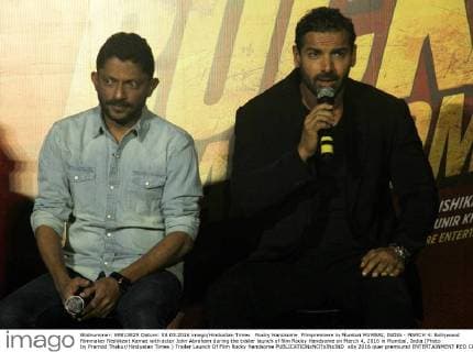 Rocky Handsome Filmpremiere in Mumbai MUMBAI, INDIA - MARCH 4: Bollywood filmmaker Nishikant Kamat with actor John Abraham during the trailer launch of film Rocky Handsome on March 4, 2016 in Mumbai, India.(Photo by Pramod Thakur Hindustan Times ) Trailer Launch Of Film Rocky Handsome