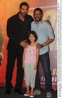 Rocky Handsome Filmpremiere in Mumbai MUMBAI, INDIA - MARCH 4: Bollywood filmmaker Nishikant Kamat with actor John Abraham and child actor Diya Chalwad during the trailer launch of film Rocky Handsome on March 4, 2016 in Mumbai, India.(Photo by Pramod Thakur Hindustan Times ) Trailer Launch Of Film Rocky Handsome
