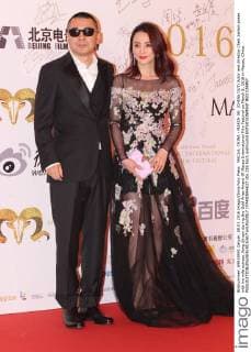 MACAU, CHINA - MARCH 08: (CHINA OUT) Actor and director Chen Jianbin poses with his wife actress Jiang Qinqin during the Gold Aries Award Of Macau International Film Festival on March 8, 2016 in Macau, China.  CFP480844637