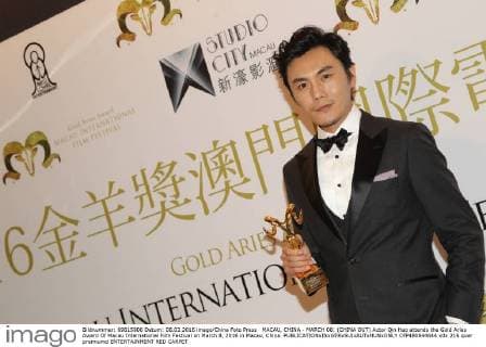 MACAU, CHINA - MARCH 08: (CHINA OUT) Actor Qin Hao attends the Gold Aries Award Of Macau International Film Festival on March 8, 2016 in Macau, China.  CFP480844644