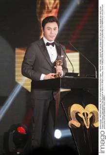 MACAU, CHINA - MARCH 08: (CHINA OUT) Actor Qin Hao attends the Gold Aries Award Of Macau International Film Festival on March 8, 2016 in Macau, China.  CFP480844673