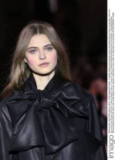 A model takes to the catwalk during the presentation of Moon Young Hee s show as part of the Fall-Winter 2016-2017 Fashion Week in Paris on March 9, 2016.  PAR20160309109 MAYAxVIDON-WHITE