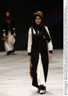 Indonesia: Fashion Week 2016 A model presents a creation by Errin Uggaru during Indonesia Fashion Week 2016 at Jakarta Convention Center in Jakarta, Indonesia. The theme of Indonesian Fashion Week 2016 are Reflections of Culture.  RahmadxAzharxHutomo