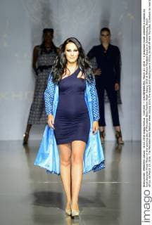 (160310) -- JOHANNESBURG, March 10, 2016 -- A pregnant model presents a creation by local designer Khosi Nkosi on the opening day of Mercedes-Benz Fashion Week Joburg 2016 at Nelson Mandela Square in Johannesburg, South Africa, on March 10, 2016. The Mercedes-Benz Fashion Week Joburg 2016, the largest and leading one in Africa, kicked off here Thursday. Creations by nearly 20 South African fashion designers are scheduled to be presented in 14 shows of the following three days. ) SOUTH AFRICA-JOHANNESBURG-FASHION WEEK ZhaixJianlan 