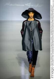 (160310) -- JOHANNESBURG, March 10, 2016 -- A model presents a creation by local designer Marianne Fassler on the opening day of Mercedes-Benz Fashion Week Joburg 2016 at Nelson Mandela Square in Johannesburg, South Africa, on March 10, 2016. The Mercedes-Benz Fashion Week Joburg 2016, the largest and leading one in Africa, kicked off here Thursday. Creations by nearly 20 South African fashion designers are scheduled to be presented in 14 shows of the following three days. ) SOUTH AFRICA-JOHANNESBURG-FASHION WEEK ZhaixJianlan 