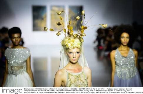 (160310) -- JOHANNESBURG, March 10, 2016 -- Models present creations by local designer Stefania Morland on the opening day of Mercedes-Benz Fashion Week Joburg 2016 at Nelson Mandela Square in Johannesburg, South Africa on March 10, 2016. The Mercedes-Benz Fashion Week Joburg 2016, the largest and leading one in Africa, kicked off here Thursday. Creations by nearly 20 South African fashion designers are scheduled to be presented in 14 shows of the following three days. ) SOUTH AFRICA-JOHANNESBURG-FASHION WEEK ZhaixJianlan 