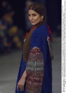 Pakistan Fashion Design Council Fashion Week in Lahore Pakistani model presents creations of the famous designer SAIQA RAHEEM on the first day of Pakistan Fashion Design Council (PFDC) Fashion Week.  RanaxSajidxHussain