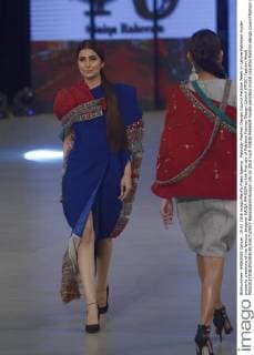 Pakistan Fashion Design Council Fashion Week in Lahore Pakistani model presents creations of the famous designer SAIQA RAHEEM on the first day of Pakistan Fashion Design Council (PFDC) Fashion Week.  RanaxSajidxHussain