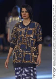 Pakistan Fashion Design Council Fashion Week in Lahore Pakistani model presents creations of the famous designer MUSE on the first day of Pakistan Fashion Design Council (PFDC) Fashion Week.  RanaxSajidxHussain
