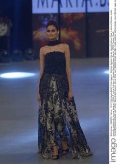 Pakistan Fashion Design Council Fashion Week in Lahore Pakistani model presents creations by famous designer MARIA.B on the first day of Pakistan Fashion Design Council (PFDC) Fashion Week.  RanaxSajidxHussain