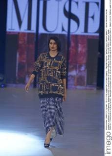 Pakistan Fashion Design Council Fashion Week in Lahore Pakistani model presents creations of the famous designer MUSE on the first day of Pakistan Fashion Design Council (PFDC) Fashion Week.  RanaxSajidxHussain