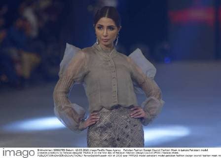 Pakistan Fashion Design Council Fashion Week in Lahore Pakistani model presents creations by famous designer MARIA.B on the first day of Pakistan Fashion Design Council (PFDC) Fashion Week.  RanaxSajidxHussain