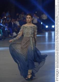 Pakistan Fashion Design Council Fashion Week in Lahore Pakistani model presents creations by famous designer MARIA.B on the first day of Pakistan Fashion Design Council (PFDC) Fashion Week.  RanaxSajidxHussain