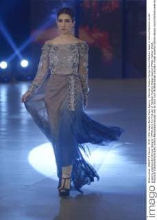 Pakistan Fashion Design Council Fashion Week in Lahore Pakistani model presents creations by famous designer MARIA.B on the first day of Pakistan Fashion Design Council (PFDC) Fashion Week.  RanaxSajidxHussain