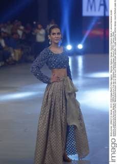 Pakistan Fashion Design Council Fashion Week in Lahore Pakistani model presents creations by famous designer MARIA.B on the first day of Pakistan Fashion Design Council (PFDC) Fashion Week.  RanaxSajidxHussain