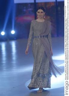Pakistan Fashion Design Council Fashion Week in Lahore Pakistani model presents creations by famous designer MARIA.B on the first day of Pakistan Fashion Design Council (PFDC) Fashion Week.  RanaxSajidxHussain