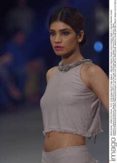 Pakistan Fashion Design Council Fashion Week in Lahore Pakistani model presents creations by famous designer SUBLIME by SARA on the first day of Pakistan Fashion Design Council (PFDC) Fashion Week.  RanaxSajidxHussain