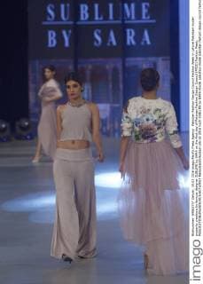 Pakistan Fashion Design Council Fashion Week in Lahore Pakistani model presents creations by famous designer SUBLIME by SARA on the first day of Pakistan Fashion Design Council (PFDC) Fashion Week.  RanaxSajidxHussain