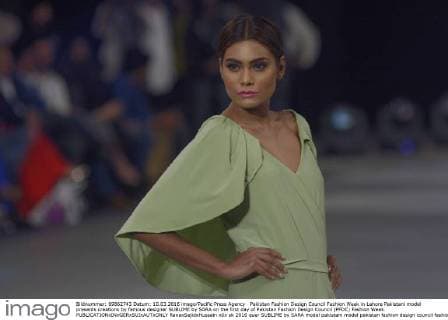 Pakistan Fashion Design Council Fashion Week in Lahore Pakistani model presents creations by famous designer SUBLIME by SARA on the first day of Pakistan Fashion Design Council (PFDC) Fashion Week.  RanaxSajidxHussain