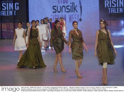 Pakistan Fashion Design Council Fashion Week in Lahore Pakistani models present creations of the famous designer SAIQA RAHEEM on the first day of Pakistan Fashion Design Council (PFDC) Fashion Week.  RanaxSajidxHussain