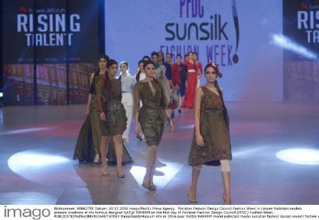 Pakistan Fashion Design Council Fashion Week in Lahore Pakistani models present creations of the famous designer SAIQA RAHEEM on the first day of Pakistan Fashion Design Council (PFDC) Fashion Week.  RanaxSajidxHussain