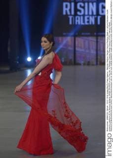 Pakistan Fashion Design Council Fashion Week in Lahore Pakistani model presents creations of the famous designer SAIQA RAHEEM on the first day of Pakistan Fashion Design Council (PFDC) Fashion Week.  RanaxSajidxHussain