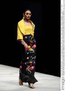 March 11, 2016 - Jakarta, Indonesia - JAKARTA, INDONESIA - MARCH 10: A model showcases designs by Chossy Latu during The 5th Indonesia Fashion Week at Jakarta Convention Centre on March 10, 2016 in Jakarta, Indonesia. The 5th Indonesia Fashion Week theme is Reflections of Culture, as local culture and tradition will be the basis and reference of the designs for Indonesia fashion design trend that would be able to carve Indonesia identity in the world of fashion that reflects its own culture. Indonesia hope to become the central of world design with modern designs in a variety of textures and colors. Jakarta Indonesia - ZUMAp112