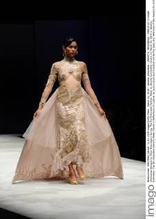 March 11, 2016 - Jakarta, Indonesia - JAKARTA, INDONESIA - MARCH 10: A model showcases designs by Adjie Notonegoro during The 5th Indonesia Fashion Week at Jakarta Convention Centre on March 10, 2016 in Jakarta, Indonesia. The 5th Indonesia Fashion Week theme is Reflections of Culture, as local culture and tradition will be the basis and reference of the designs for Indonesia fashion design trend that would be able to carve Indonesia identity in the world of fashion that reflects its own culture. Indonesia hope to become the central of world design with modern designs in a variety of textures and colors. Jakarta Indonesia - ZUMAp112