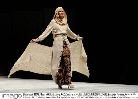 March 11, 2016 - JAKARTA, INDONESIA - MARCH 11: A model showcases designs by Ida Royani in the Sentuhan Ethnic NTT show during The 5th Indonesia Fashion Week at Jakarta Convention Centre on March 11, 2016 in Jakarta, Indonesia. The 5th Indonesia Fashion Week theme is Reflections of Culture, as local culture and tradition will be the basis and reference of the designs for Indonesia fashion design trend that would be able to carve Indonesia identity in the world of fashion that reflects its own culture. Indonesia hopes to become the Paris of Muslim fashion with modern designs in a variety of textures and colors. - ZUMAp112